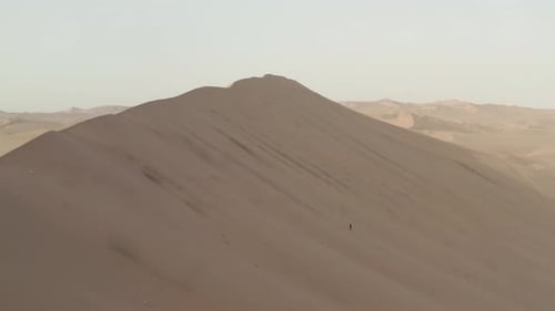 Aerial of sand dune outside of Ica, Peru near Huacachina.