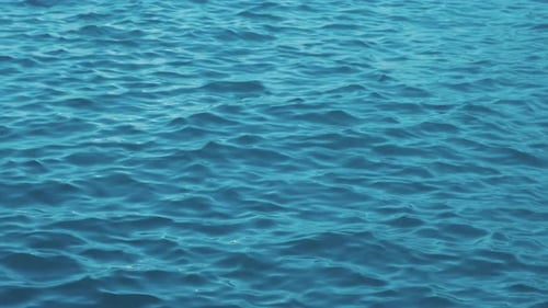 Slow motion of blue sea water surface. The unsurpassed beauty of sea water.