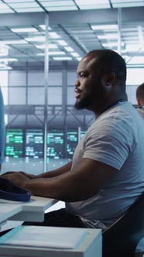 Team of Admins Doing Checkup to Prolong Data Center Electronics Life Span