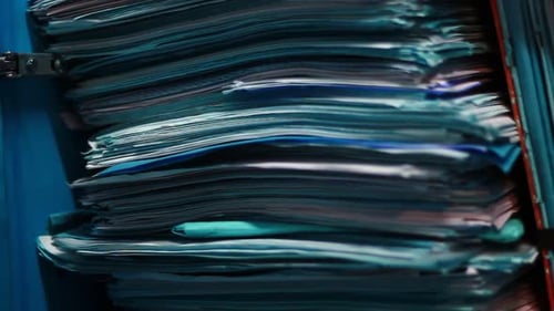 Archived Papers in Stacks in a Drawer