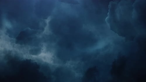 Dramatic Clouds Billowing in a Dark Night Sky