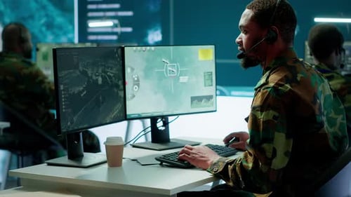 Army Intelligence Specialist Utilize Advanced Computer Systems