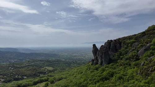 Flight over Meteora, monasteries and rock formation in Trikala, Thessaly. Greece