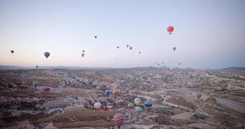 Hot Air Balloons Soaring Over the Unique Rock Formations of Cappadocia, Turkey