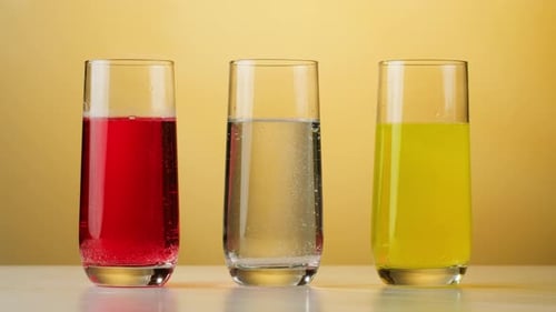 Colorful Refreshments in Clear Glasses on a Table