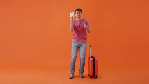 Excited Tourist Man Holding Tickets and Suitcase in Studio