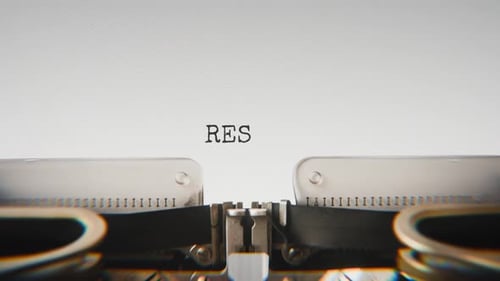 Old mechanical typewriter typing Respect in a close-up view.