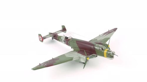 Model Airplane Rotating on White Background