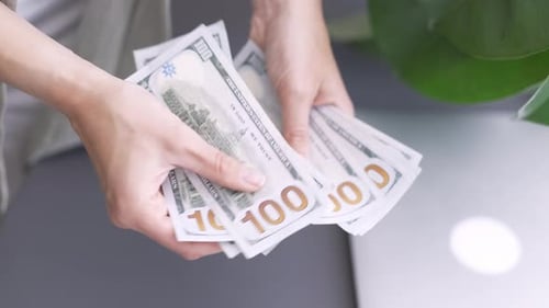 Close Up Woman Hands Counting Cash Money 1000 American Dollars Banknotes Income Winner and Business