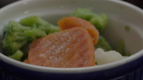 Frozen Vegetables: Broccoli, Carrots, and Cauliflower in Bowl