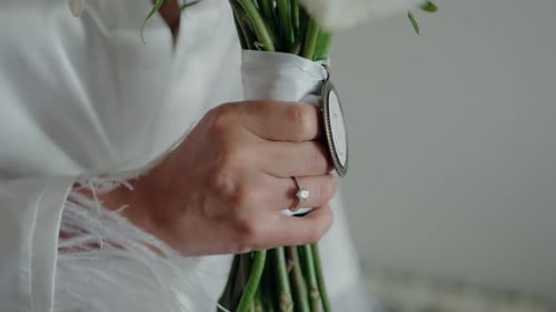 Close Up of Bride Holding Wedding Bouquet