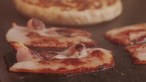 Cooking American Fat Smash Burger and Bacon Slice on Grill Closeup Chiken or Fish Cutlet Smashing By