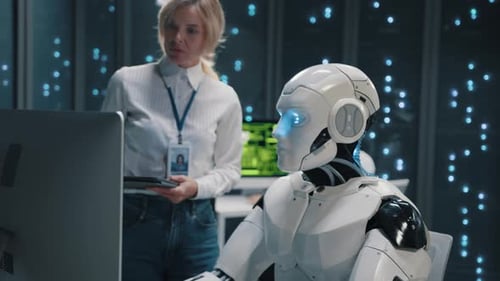 White Cybernetic Robot Working Computer Project Typing Keboard Cooperating at Digital Hightech