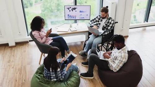 Diverse Team Collaborating with Hands Together During Business Meeting