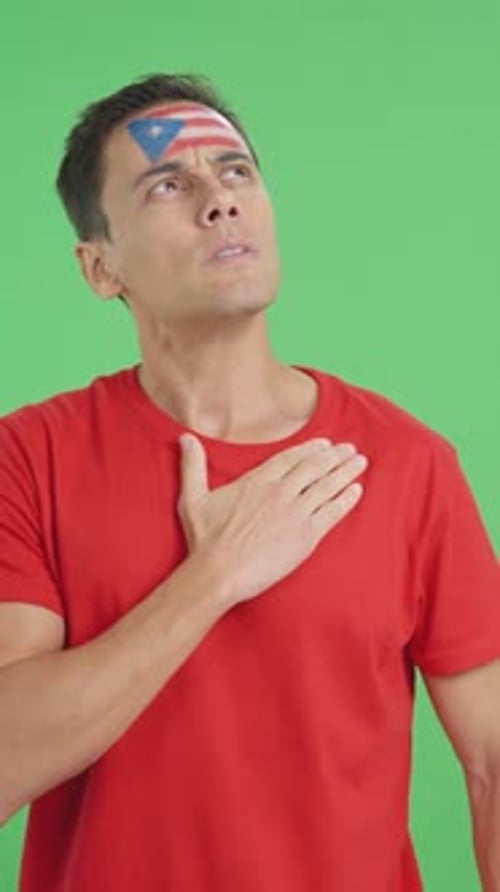 Man with Flag Painted on Forehead Pledges Allegiance