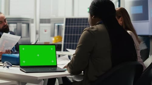 Researcher Analyzes Prototypes Using Laptop to Optimize Energy Production
