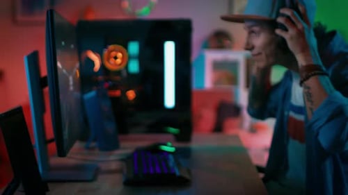 Young Man Plays Video Game in Colorful Room
