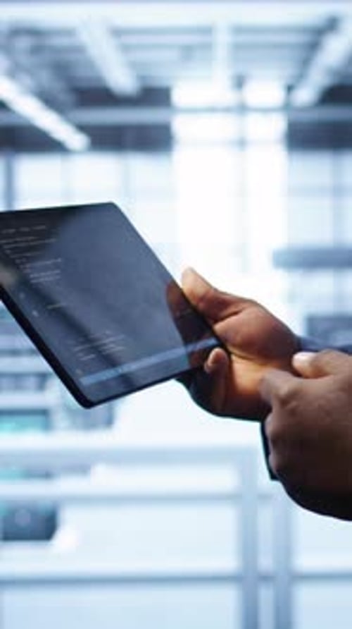 Vertical Video Close Up of Worker Fixing Errors Affecting Servers Performance