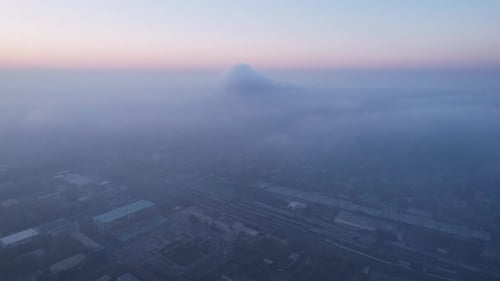 Epic Gray Smog is Visible at Sunset Over the City