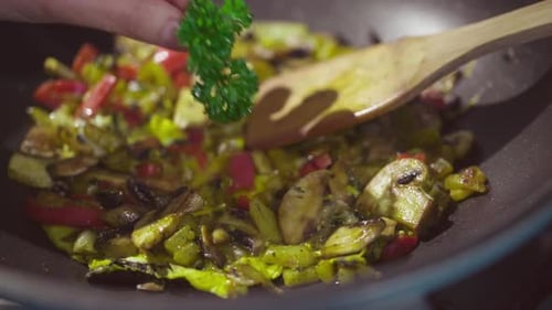 Vegetables Cooking in Wok with Parsley