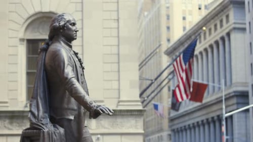 The Statue of George Washington on Wall St in the financial district of Manhattan in New York City.