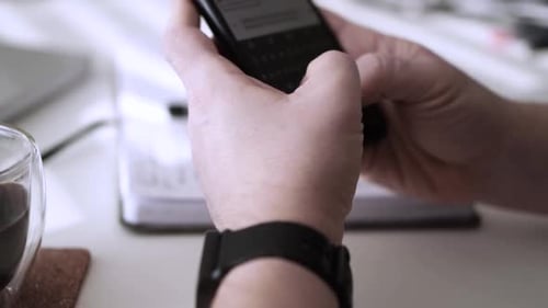 Man scrolling social media in smartphone