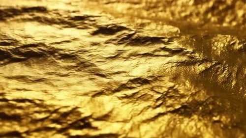 Fond abstrait en métal liquide ondulé doré