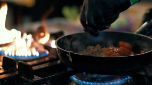 Closeup Chef Hands Cooking Tasty Thai Meal at Kitchen Restaurant. Man Hands