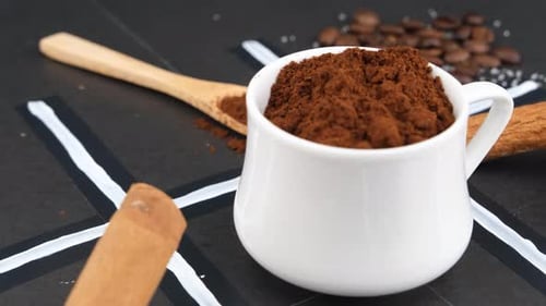 Coffee Grounds and Cinnamon Sticks Close Up