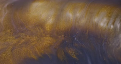 Golden Pigment Flowing Abstractly