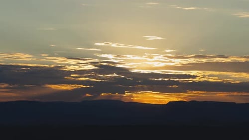 Majestic Mountain Sunset with Golden Light