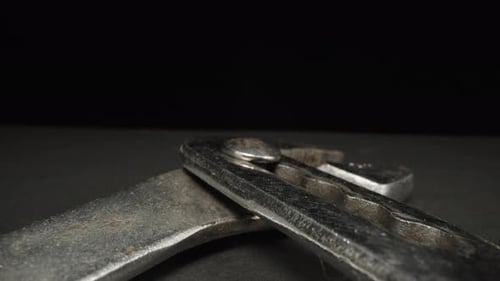 Adjustable wrench close-up. Dolly slider extreme close-up.