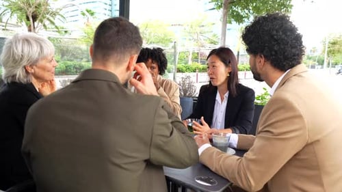 Relaxed Business People in a Cafeteria During Work Break