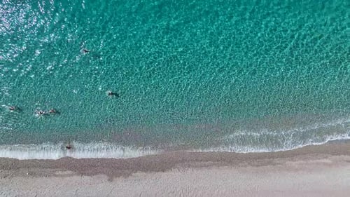 Aerial View Magical Crystal Beach People Relaxing Paddleboarding and Swimming