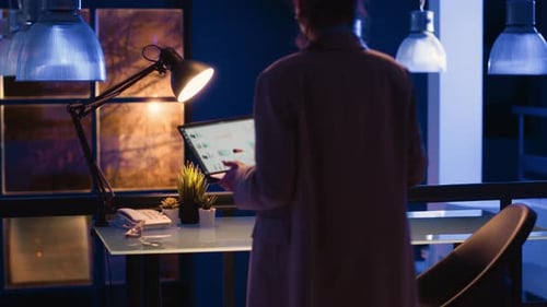 Entrepreneur Analyzing Company Analytics in Office