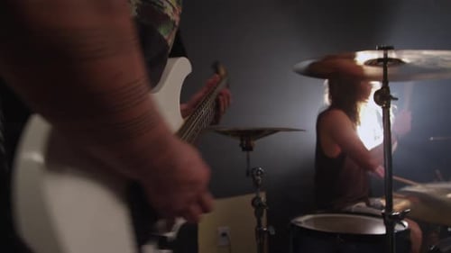 Guitar and Drums in Heavy Metal Rock Band Artist