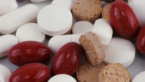 Pharmacy background. Tablets and pills. Medicine and healthy. Close up of capsules.