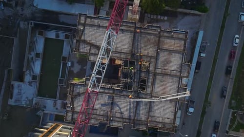 Aerial Video Construction Teams Preparing Floors for Concrete Pouring and Installing Metal Framework