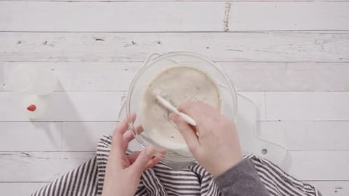 Mixing ingredients in bowl for dessert topping
