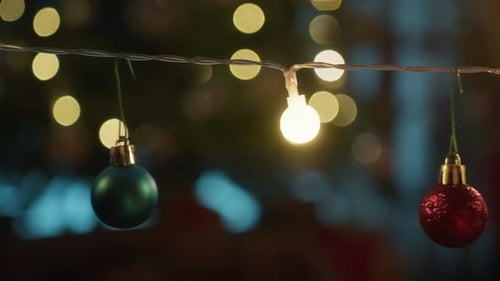 Christmas Ornaments and Lights Hanging Close Up