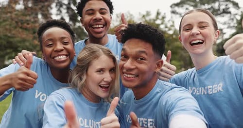 Thumbs up, volunteer and selfie of people in park for charity event, community service and teamwork