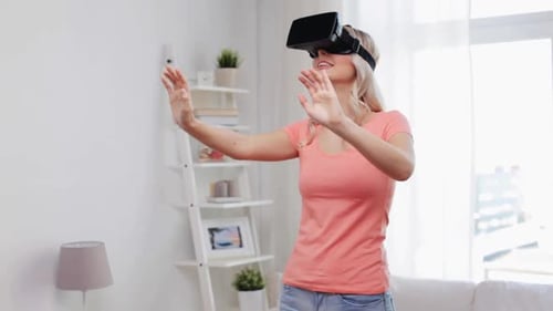 Smiling Woman Wearing VR Headset in Bright Home
