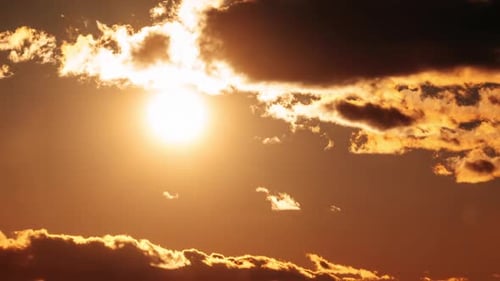 Golden Hour Sun Bursts Through the Clouds