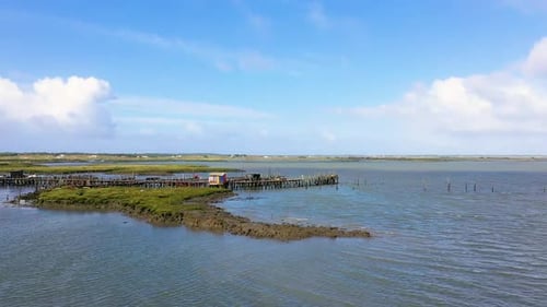 Aerial view of coastal wetlands near Longueira.
