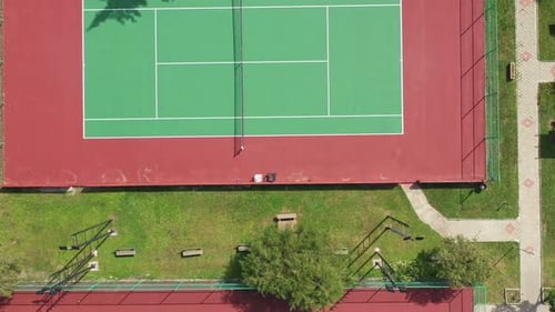 Bird Eye View of New Empty Tennis Court in Sunny Day