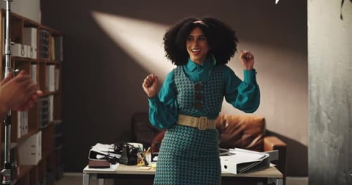 Woman Dances to Applause in Office Space