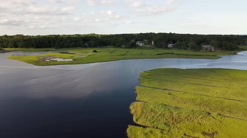Aerial View Of Salt Marsh With Green Vegetation Near Scituate Town in Massachusetts. - pullback