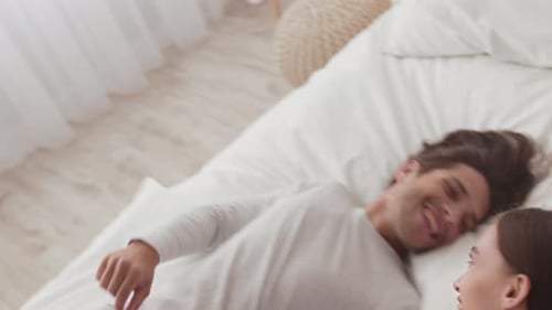 Loving Couple Affectionately Gaze at Each Other