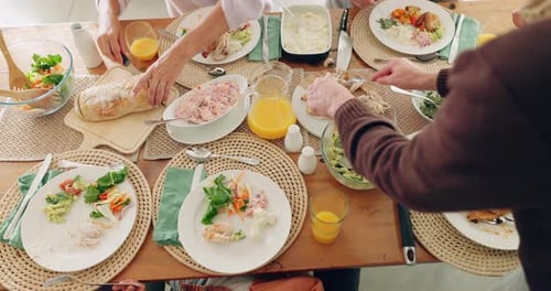 Family Gathering Around Table for Meal