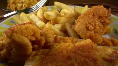 Golden Fried Chicken and Chips Close Up